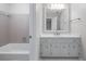Classic bathroom with a clean design, tub and shower combination, and a white vanity sink at 763 Old Paper Mill Se Dr, Marietta, GA 30067