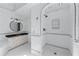 Elegant bathroom features a stand-up shower with glass door and vanity with decorative mirror at 763 Old Paper Mill Se Dr, Marietta, GA 30067