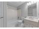 Cozy bathroom featuring a tub, shower, toilet and vanity sink at 763 Old Paper Mill Se Dr, Marietta, GA 30067