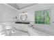 Bathroom features corner tub and a granite-topped vanity at 763 Old Paper Mill Se Dr, Marietta, GA 30067