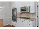 Kitchen features modern appliances and granite countertops at 763 Old Paper Mill Se Dr, Marietta, GA 30067