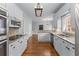 Well-appointed kitchen with granite countertops, stainless steel appliances, and ample cabinet space at 763 Old Paper Mill Se Dr, Marietta, GA 30067