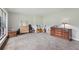 Spacious bedroom with natural light, neutral carpet, and classic furniture for comfortable living at 112 Pioneer Trail, Cartersville, GA 30121