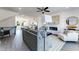 Open-concept living space with seamless flow to kitchen, comfortable seating, and modern finishes at 1725 Lansmere Sw St, Marietta, GA 30008