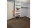 Cozy bedroom with built in shelving and a closet at 2030 Carr Rd, Conyers, GA 30012