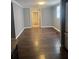 Open-concept dining room featuring hardwood floors and ample natural light at 2030 Carr Rd, Conyers, GA 30012