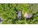 Aerial view of the property showcasing its lush surroundings and well-maintained landscaping at 2766 Stonecreek Se Rd, Smyrna, GA 30080