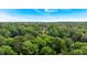 Lush green trees surround the property, offering a secluded and picturesque landscape at 2766 Stonecreek Se Rd, Smyrna, GA 30080