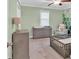 This bedroom features a ceiling fan, crib and toddler bed at 2766 Stonecreek Se Rd, Smyrna, GA 30080