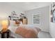 Cozy bedroom with soft lighting, neutral colors, and a comfortable bed at 3142 Washburn St, Atlanta, GA 30354