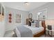 Charming bedroom with a classic bed, patterned bedding, and ample natural light at 3142 Washburn St, Atlanta, GA 30354