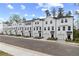 Modern townhome community featuring multiple units with individual garages, set in a suburban neighborhood at 3142 Washburn St, Atlanta, GA 30354