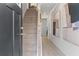 Welcoming foyer with staircase, hardwood floors, neutral paint, and elegant decor at 3142 Washburn St, Atlanta, GA 30354
