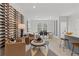 Contemporary living room with a unique wine storage wall, and comfortable seating in a bright, open space at 3142 Washburn St, Atlanta, GA 30354