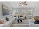 Bright living room with ample natural light, comfortable seating, and modern decor at 3142 Washburn St, Atlanta, GA 30354