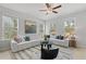 Sun-filled living room featuring large windows, plush seating, and elegant decor at 3142 Washburn St, Atlanta, GA 30354