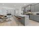 Open-concept kitchen and living area, island seating, stainless appliances at 3142 Washburn St, Atlanta, GA 30354