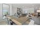 Open-concept living space featuring dining area and kitchen with stainless steel appliances at 3142 Washburn St, Atlanta, GA 30354
