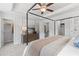 Serene main bedroom with a stylish four-poster bed and and walk-in closets at 3142 Washburn St, Atlanta, GA 30354