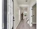 Inviting entryway features hardwood floors, neutral walls, and view of the living room at 355 Pintail Ct, Suwanee, GA 30024