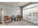 Bright and airy living room with modern flooring, large windows, and comfortable seating at 355 Pintail Ct, Suwanee, GA 30024