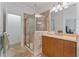 Bright bathroom featuring a walk-in shower and granite countertops at 1003 Pearl Ne Pt, Sandy Springs, GA 30328