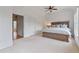 Spacious bedroom with a king bed and a view of an ensuite bathroom at 1003 Pearl Ne Pt, Sandy Springs, GA 30328