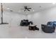 Large, bright bonus room with neutral walls, tiled floors, and ceiling fan at 1003 Pearl Ne Pt, Sandy Springs, GA 30328