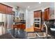 Well-appointed kitchen with stainless steel appliances, granite countertops, and custom cabinets at 1003 Pearl Ne Pt, Sandy Springs, GA 30328