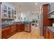 Gourmet kitchen with stainless steel appliances, granite counters, custom cabinetry and hardwood floors at 1003 Pearl Ne Pt, Sandy Springs, GA 30328