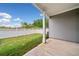 A well-maintained lawn with a white fence, complemented by blue sky in the home's backyard at 117 Point View Dr, Canton, GA 30114