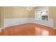 Dining room with hardwood floors, natural light, and decorative wall trim at 2457 Swan Lake Dr, Grayson, GA 30017