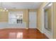 Dining room with hardwood floors, natural light, and chandelier at 2457 Swan Lake Dr, Grayson, GA 30017