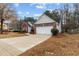 Charming single-Gathering home with an attached two car garage and paved driveway at 2457 Swan Lake Dr, Grayson, GA 30017