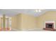 Open-concept living room with fireplace and vaulted ceiling at 2457 Swan Lake Dr, Grayson, GA 30017