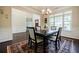 Comfortable dining space with large windows, natural light, and neutral decor at 468 Scott Farm Dr, Powder Springs, GA 30127