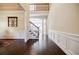 Welcoming foyer with hardwood floors and a view of the staircase at 468 Scott Farm Dr, Powder Springs, GA 30127