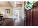 Elegant foyer with hardwood floors and staircase at 468 Scott Farm Dr, Powder Springs, GA 30127