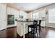 A kitchen view showing an island, stainless appliances and granite countertops at 468 Scott Farm Dr, Powder Springs, GA 30127