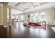 Open-concept living room with coffered ceilings and seamless flow to the kitchen at 468 Scott Farm Dr, Powder Springs, GA 30127