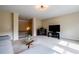 Cozy living room featuring a neutral color scheme, plush carpeting, and a glass coffee table at 468 Scott Farm Dr, Powder Springs, GA 30127