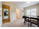 Office with an exterior view, a desk with chairs, and hardwood-style floors at 468 Scott Farm Dr, Powder Springs, GA 30127