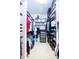 Spacious walk-in closet with adjustable shelving and hanging racks to keep items organized at 468 Scott Farm Dr, Powder Springs, GA 30127