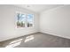 A bright bedroom with carpet, natural light and neutral paint at 470 Village Ln, Fairburn, GA 30213