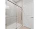 Contemporary shower with glass doors and white tiled surround at 470 Village Ln, Fairburn, GA 30213