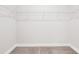Walk-in closet with installed shelving at 470 Village Ln, Fairburn, GA 30213