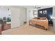 Inviting bedroom next to the living area with a comfortable bed and ample space at 620 Peachtree Ne St # 403, Atlanta, GA 30308