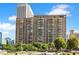 High-rise building exterior featuring multiple balconies and a view of the surrounding cityscape at 620 Peachtree Ne St # 403, Atlanta, GA 30308