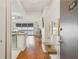 Inviting hallway leading to an open living space with modern finishes and ample natural light at 620 Peachtree Ne St # 403, Atlanta, GA 30308