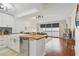 Well-lit kitchen open to the living space, featuring modern appliances and a breakfast bar at 620 Peachtree Ne St # 403, Atlanta, GA 30308
